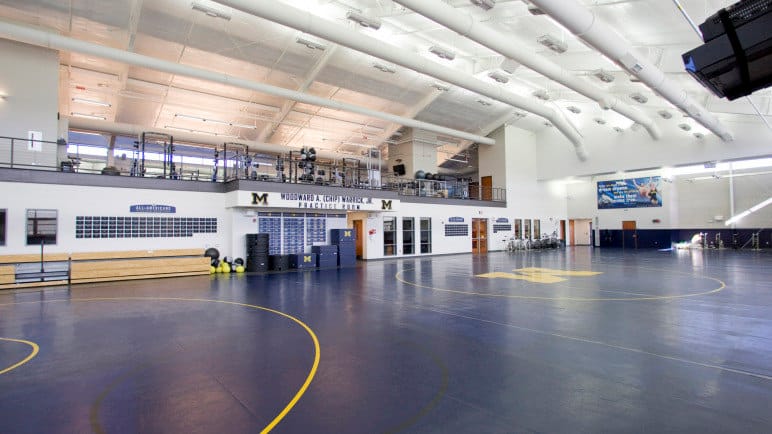 University of Michigan 2010-11 wrestling team photo (reshoot after roster changes) and facilities shots of Bahna locker room, training room, and practice/weight areas on 11/2/10.